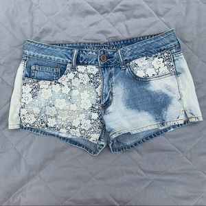 American Eagle denim shorts with white lace detailing